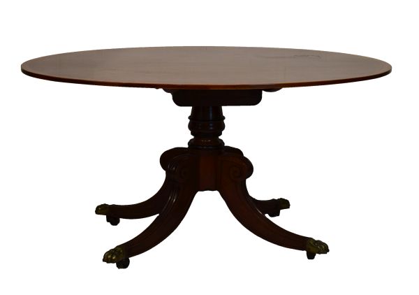 Regency satinwood crossbanded mahogany oval snap top breakfast table standing on a turned pillar and