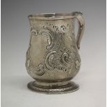 George II silver baluster shaped mug having later embossed decoration, acanthus scroll handle and