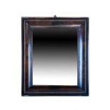 18th Century walnut rectangular cushion framed wall mirror, 72cm x 61cm inclusive of frame