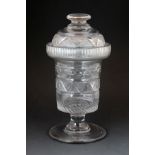 Regency glass jar having a raised rim, band of strawberry cut decoration, the domed cover with