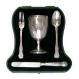 Victorian silver christening set having engraved fern and other foliate decoration and comprising: