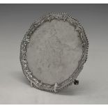 George III silver salver, the gadrooned pie-crust edge having stylised foliate decoration,