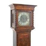 Early 20th Century walnut and figured walnut cased grandmother clock, the hood having a moulded