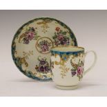 18th Century Worcester tea cup and saucer decorated with gilt highlighted polychrome enamels, the