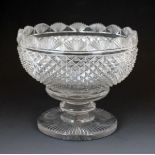 Regency cut glass bowl having a fan cut rim, standing on a short knopped stem and circular foot,