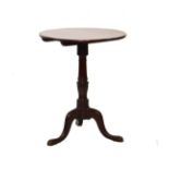 George III mahogany circular snap top wine table standing on a turned pillar and tripod base, 58.5cm