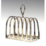 George V silver six division toast rack having a central loop handle, makers Atkin Brothers,