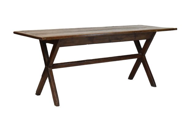 Antique oak rectangular top refectory style tavern table standing on an X frame base united by a