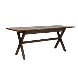 Antique oak rectangular top refectory style tavern table standing on an X frame base united by a
