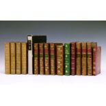 Books - A collection of leather and part leather bound volumes including; T.B. Macaulay - Critical