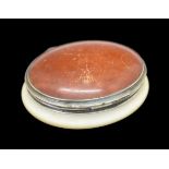 19th Century white metal mounted ivory oval snuff box, 7.5cm wide Condition: Small split to the