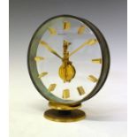 Jaeger-LeCoultre circular brass cased mantel clock having a clear glass front and back panel