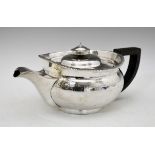 George III silver teapot of squat circular form having a gadrooned edge, engraved Greek key