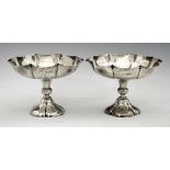 Pair of Victorian silver sweetmeat stands, each having a ruffled rim and standing on a knopped