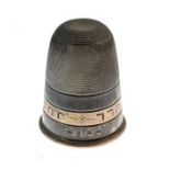 Victorian silver tot measure in the form of a thimble, having a band of script 'Just A Thimble