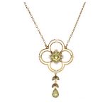 Edwardian peridot and seed pearl pendant, stamped '15ct', of quatrefoil design, cluster centre, with