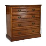 Edwardian walnut chest of two short and three long graduated drawers on a plinth base Condition: