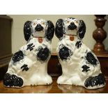 Pair of 19th Century Staffordshire pottery comforter spaniels, each having black patched