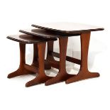 Nest of three 1970's period mahogany finish coffee tables Condition: