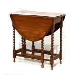 Oak two flap oval gateleg tea table on barley twist supports Condition: