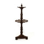 19th Century mahogany hunting boot rack standing on a turned pillar and platform tripod base with