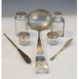 Silver handled button hook, four glass requisites each having an engraved silver cover, silver