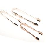 Two pairs of Victorian silver sugar tongs, London 1848 and 1865 together with a pair of George V