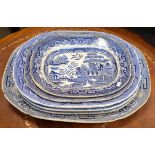 Six 19th Century blue and white transfer printed meat dishes decorated with the Willow pattern