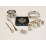 Various silver items including napkin ring, spoon, bangle etc, together with a small quantity of