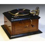 Table top wind-up gramophone in an oak and ebonised case Condition: