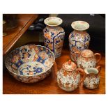 Japanese Imari bowl, pair of similar vases and a Kutani three piece tea set Condition: