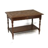 Early 20th Century walnut and beech table, the rectangular top with heavily carved geometric