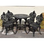 Set of four reproduction heavy cast metal garden chairs, each standing on cabriole supports together