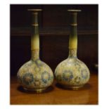 Pair of Doulton Lambeth Slaters Patent baluster shaped vases having typical textured foliate