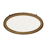 Early 20th Century gilt framed oval bevelled wall mirror, overall dimensions 70cm x 100cm Condition: