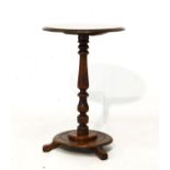 19th Century mahogany and beech circular topped occasional table on a turned pillar and circular