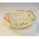 Beleek porcelain basket having polychrome floral encrusted decoration Condition: