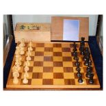 Chess set, set of draughts and a board Condition: