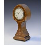 Edwardian inlaid mahogany balloon clock, the white enamel dial with Roman numerals, standing on