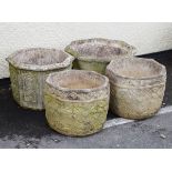 Four various modern 'stone' garden pots Condition: