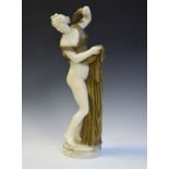 19th Century carved alabaster figure depicting a classical maiden wearing a gold painted gown