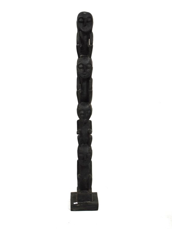 African style carving depicting four figures seated on each others heads, 108cm high Condition: