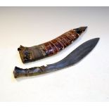 Kukri having a steel bound horn handle Condition: