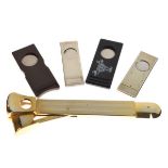 Silver mounted cigar cutter and four other cigar cutters Condition: