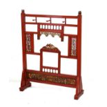 Chinese red and gilt finish stand having carved and open work decoration Condition: