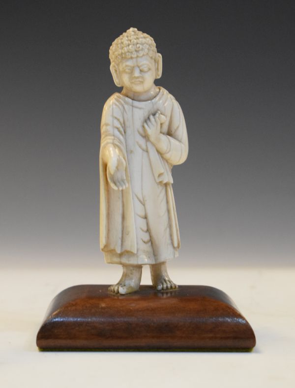 19th Century European carved ivory figure of a standing Buddha Condition: