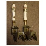 Two beer pumps, the ceramic handles with hunting decoration Condition: