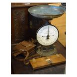 Carved beech table cabinet, pair of Salter scales, vintage tie press and a Zeiss Nettar camera