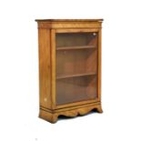 Late 19th century satinwood cabinet bookcase, the top opening to reveal a box interior, glazed