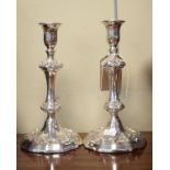 Pair of silver plated candlesticks, each having a double knopped stem and standing on circular